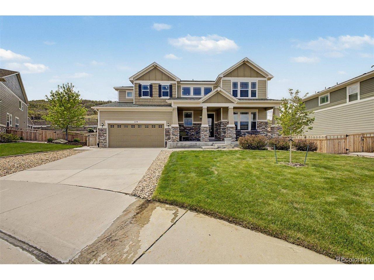 Image 4: Inviting Front Elevation with Expansive Driveway & Covered Porch