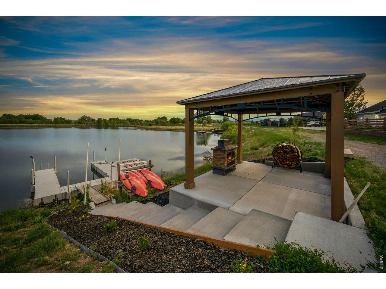 Image 3: Relax on the lake with your own covered fire pit. Image 3: Relax on the lake with your own covered fire pit.