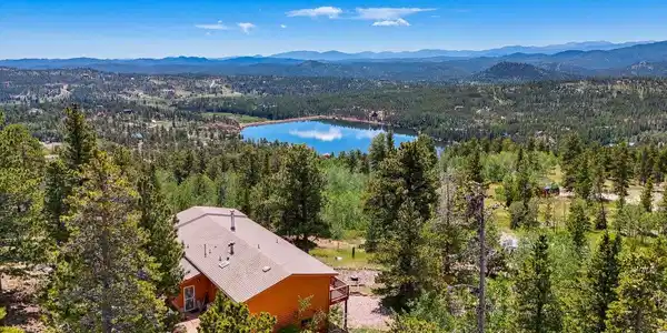 Image 2: expansive views of snowcapped mountains and lake Image 2: expansive views of snowcapped mountains and lake