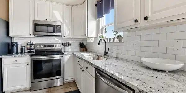Image 3: Stainless steel appliances and abundant prep space. Image 3: Stainless steel appliances and abundant prep space.
