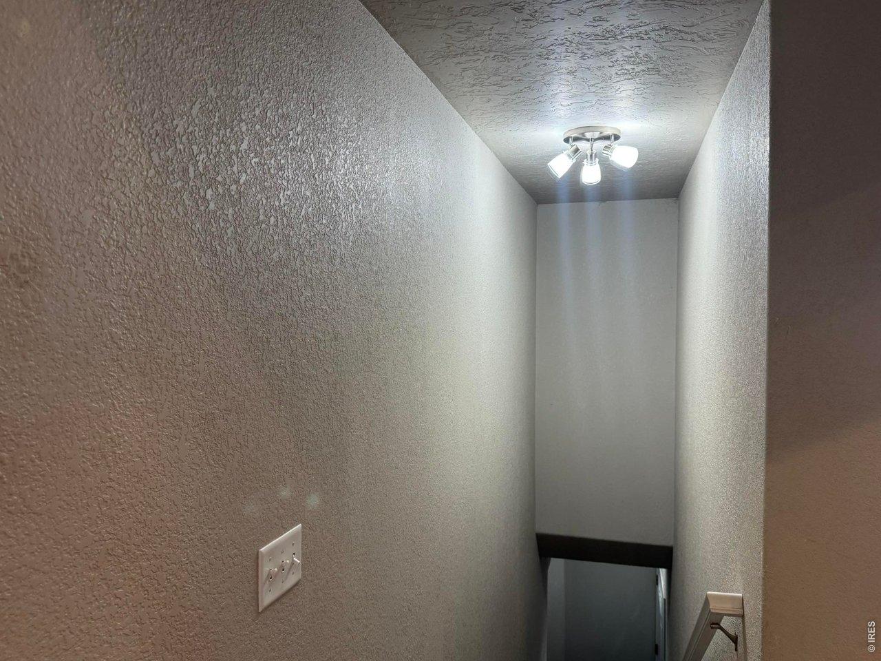 Image 4: Top of stairs from front entry remove Image 4: Top of stairs from front entry remove