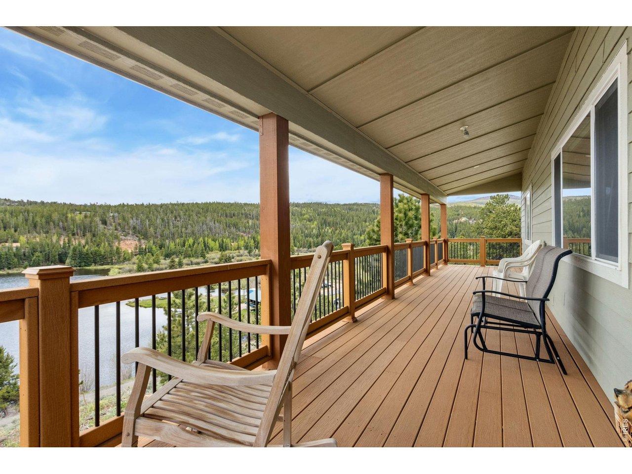 Image 2: Amazing Views, from the fantastic deck! Great setting overlooking the beautiful mountains and lake