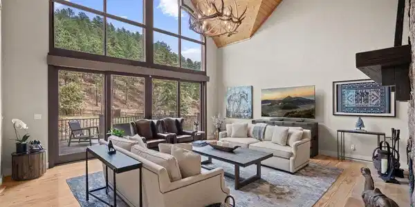 Image 4: Great room.  Gas fireplace. Large sliding doors walk out to front deck