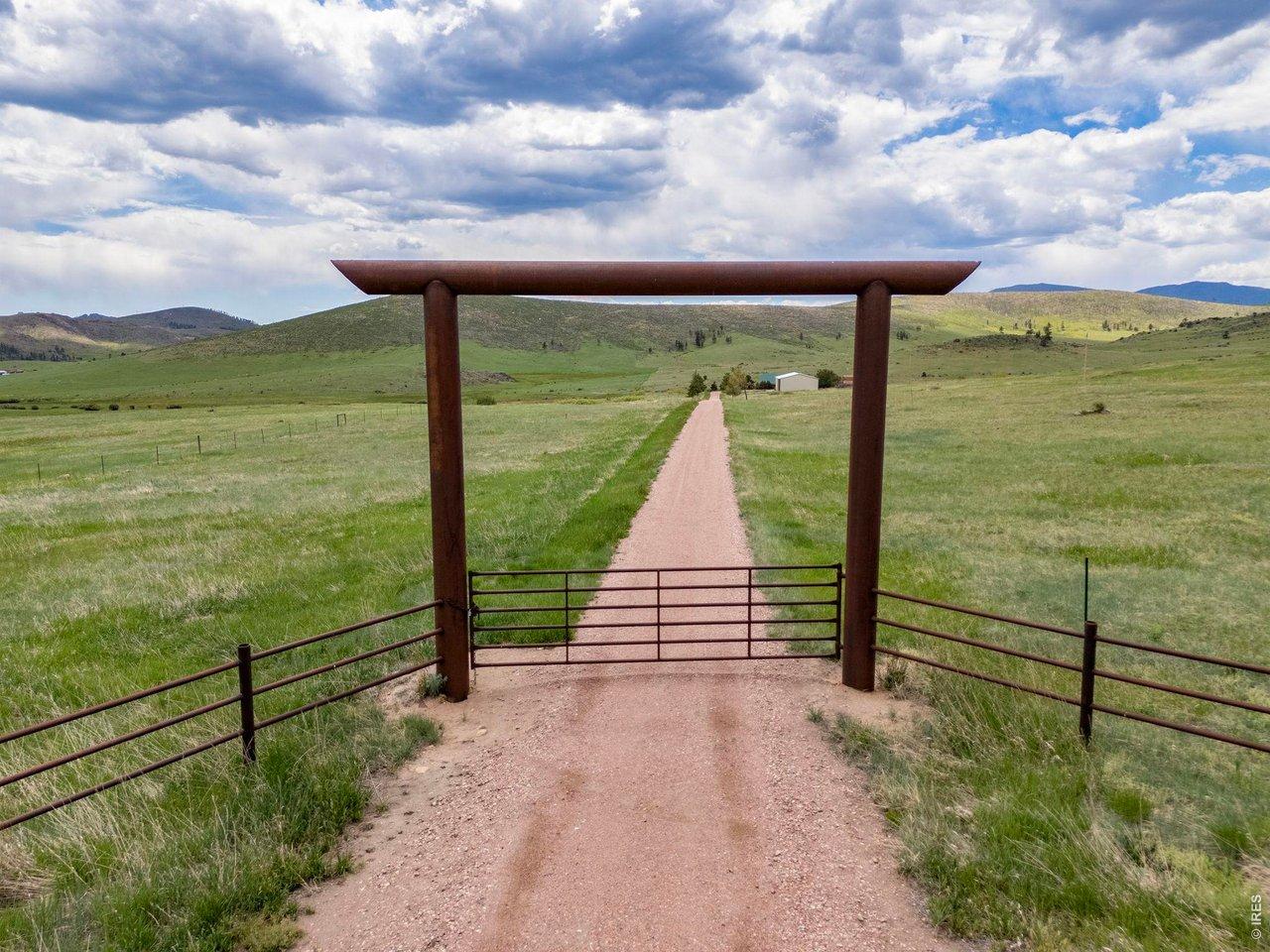 Image 4: The property is accessed through a private gate and long driveway for plenty of privacy! Image 4: The property is accessed through a private gate and long driveway for plenty of privacy!