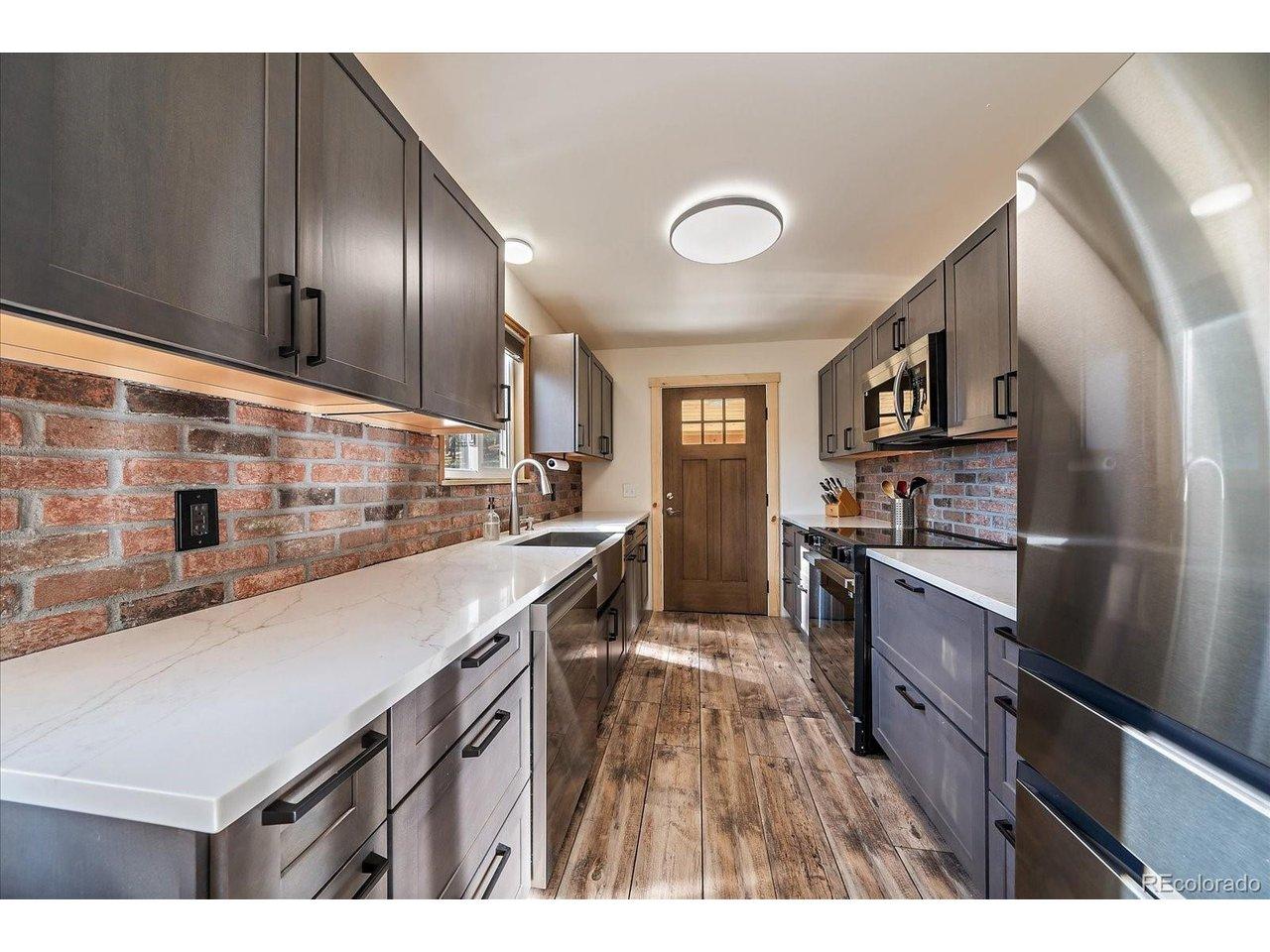 Image 3: New backsplash, cabinets and countertops Image 3: New backsplash, cabinets and countertops