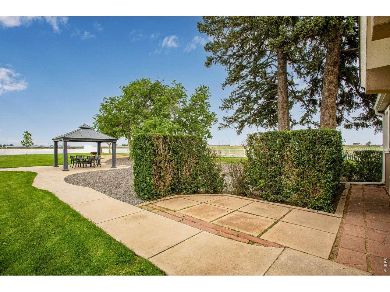 Image 4: Beautifully Manicured Landscaping With Foothill and Back Range Views.