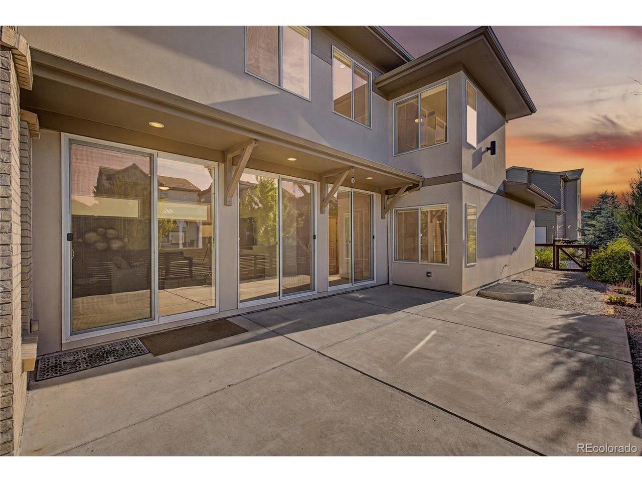 Image 2: Preview of the backyard extend patio with a wall of glass patio door perfect for entertaining