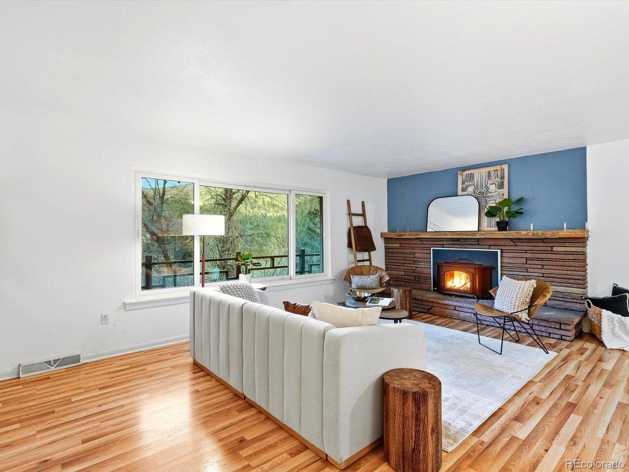 Image 3: Sun filled living room with large picture window Image 3: Sun filled living room with large picture window