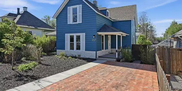 Image 2: Intricate brick driveway pairs perfectly with the newly painted home. Image 2: Intricate brick driveway pairs perfectly with the newly painted home.
