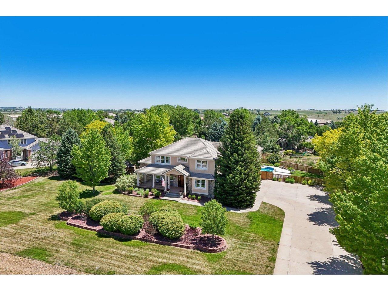 Image 2: 1 acre lot with mature landscaping and ideal outdoor spaces for fun Image 2: 1 acre lot with mature landscaping and ideal outdoor spaces for fun