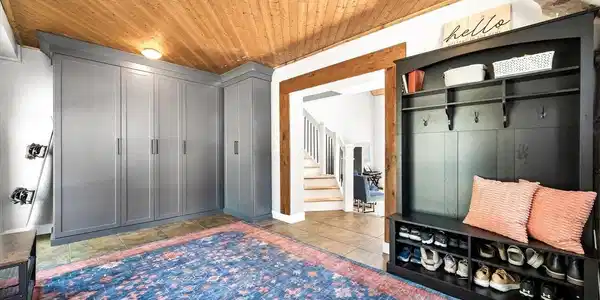 Image 3: Enter into large mudroom with floor-to-ceiling storage closets Image 3: Enter into large mudroom with floor-to-ceiling storage closets