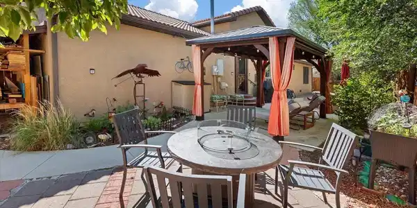 Image 4: Very private, landscaped backyard