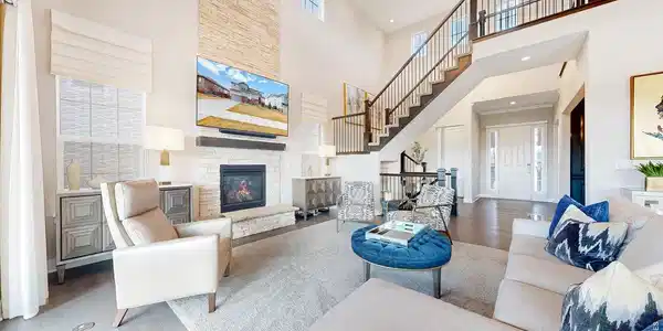 Image 2: The living room features a two-story gas fireplace Image 2: The living room features a two-story gas fireplace