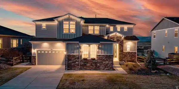 Image 3: Elegant two-story home with covered front porch and inviting curb appeal Image 3: Elegant two-story home with covered front porch and inviting curb appeal