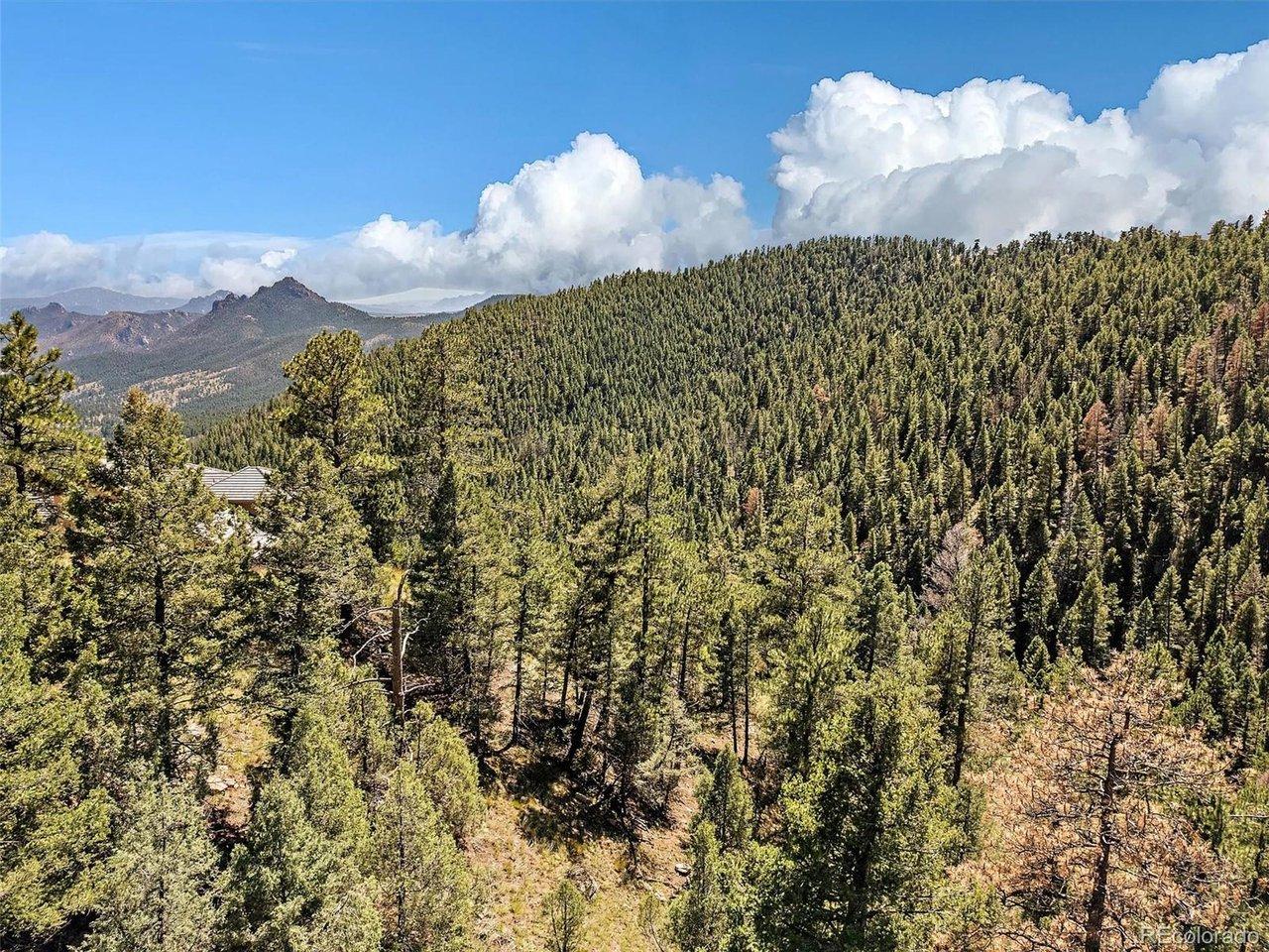 Image 3: A rare, 11.4 acre foothills property with incredible views. Image 3: A rare, 11.4 acre foothills property with incredible views.