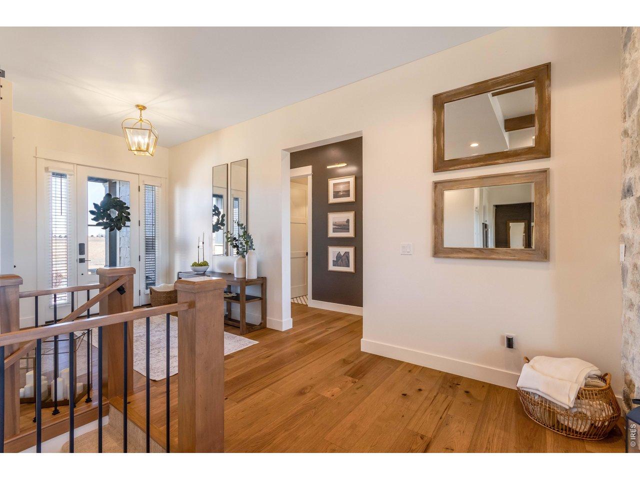Image 4: Hallway to office and 2nd Primary Bedroom with On suite Bathroom