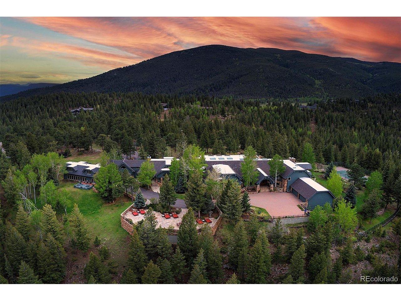 Image 1: Perched on 9+ private acres with sweeping and panoramic mountain views in Soda Creek