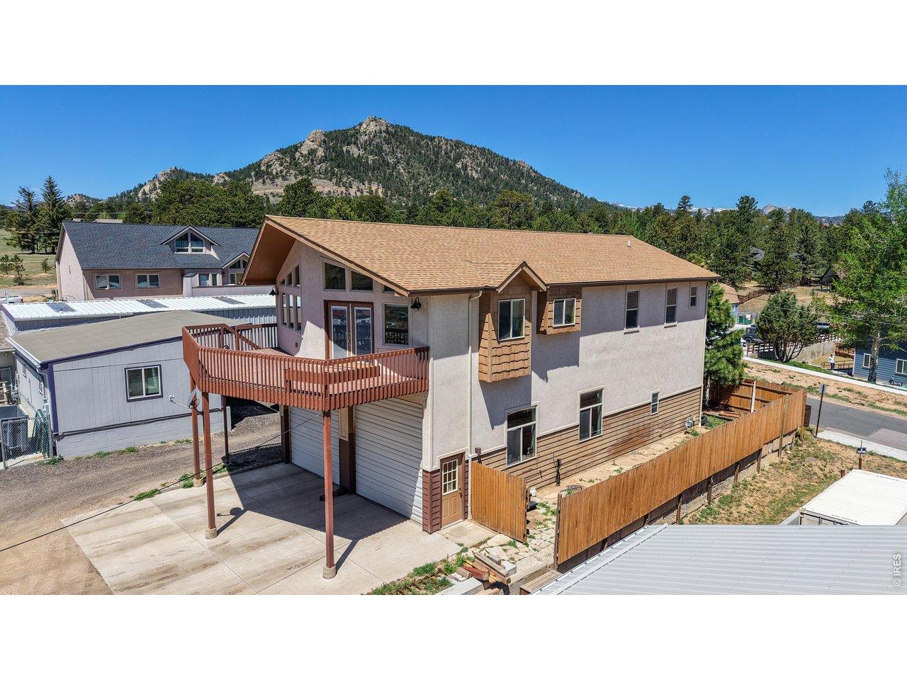 Image 1: Exterrior - Shop lower level. Fenced side yard. Image 1: Exterrior - Shop lower level. Fenced side yard.