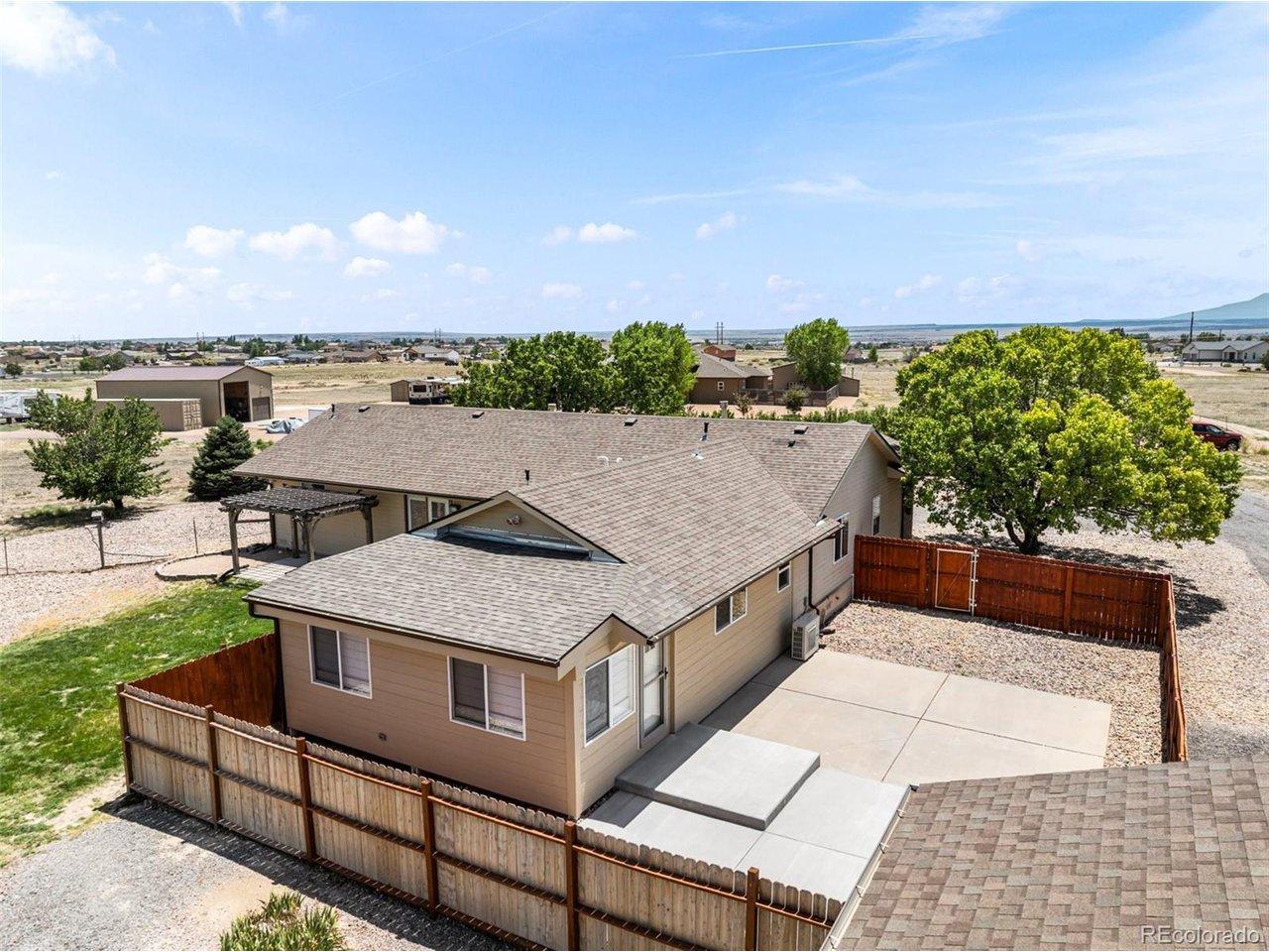 Image 4: The converted 2 car garage is a fully functional ADU with full kitchen, living room, bedroom, bath, enclosed porch, fenced yard Image 4: The converted 2 car garage is a fully functional ADU with full kitchen, living room, bedroom, bath, enclosed porch, fenced yard