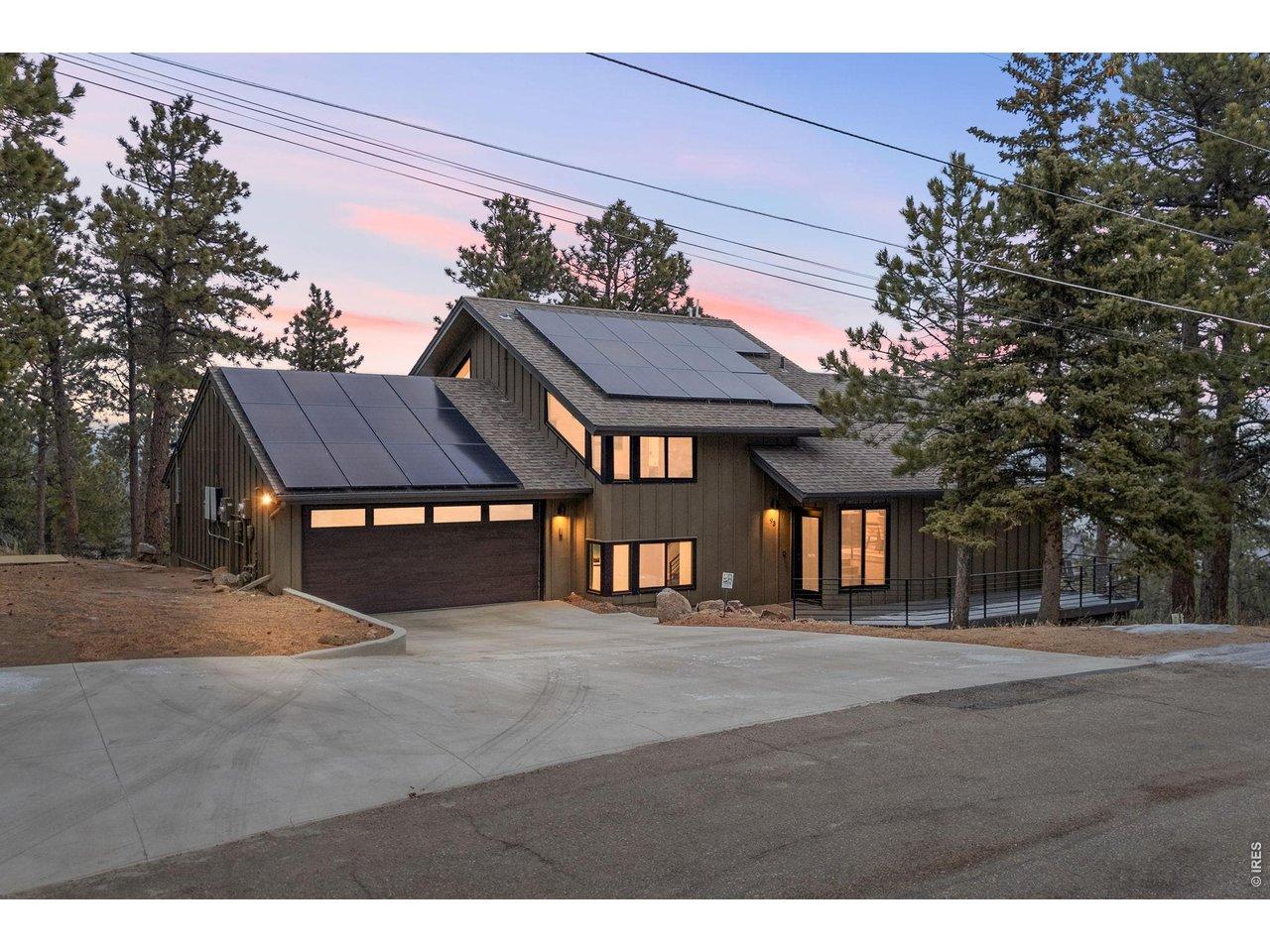 Image 2: Easy paved driveway and attached oversized garage Image 2: Easy paved driveway and attached oversized garage