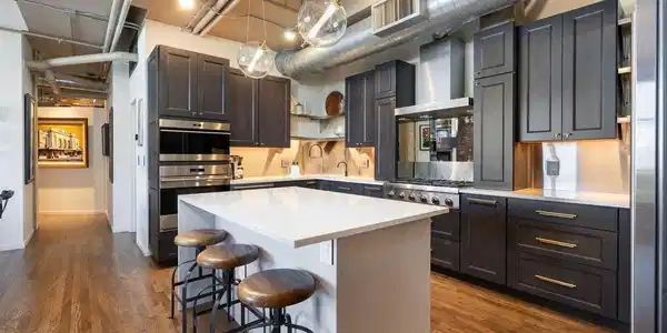 Image 4: A true chef's kitchen designed to be as beautiful as it is functional. Generous workspace, custom cabinetry and professional-grade appliances make it equally suited to a quiet evening at home or cooking and entertaining with friends. Image 4: A true chef's kitchen designed to be as beautiful as it is functional. Generous workspace, custom cabinetry and professional-grade appliances make it equally suited to a quiet evening at home or cooking and entertaining with friends.