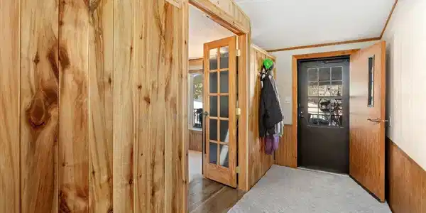 Image 4: Entryway with Office/Family room beyond the french doors Image 4: Entryway with Office/Family room beyond the french doors