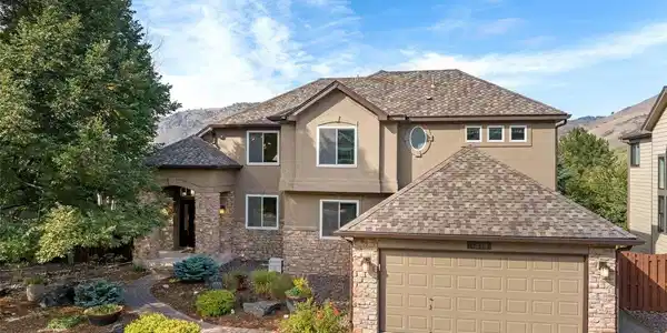 Image 2: Professional landscaping and stacked stone add to the curb appeal. Image 2: Professional landscaping and stacked stone add to the curb appeal.