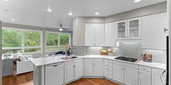 Image 3: An elevated kitchen with seamless sightlines to the living area. Image 3: An elevated kitchen with seamless sightlines to the living area.
