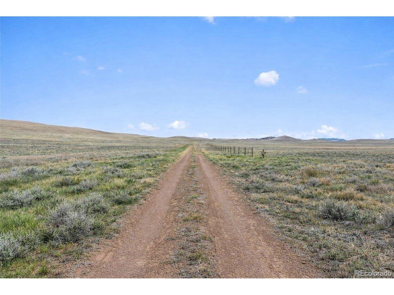 Image 1: The lot is on a dead end road.