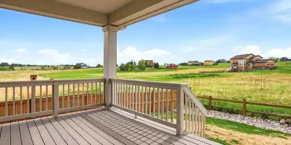 Image 4: Expansive covered back deck with sweeping views of sweeping Colorado views skies Image 4: Expansive covered back deck with sweeping views of sweeping Colorado views skies