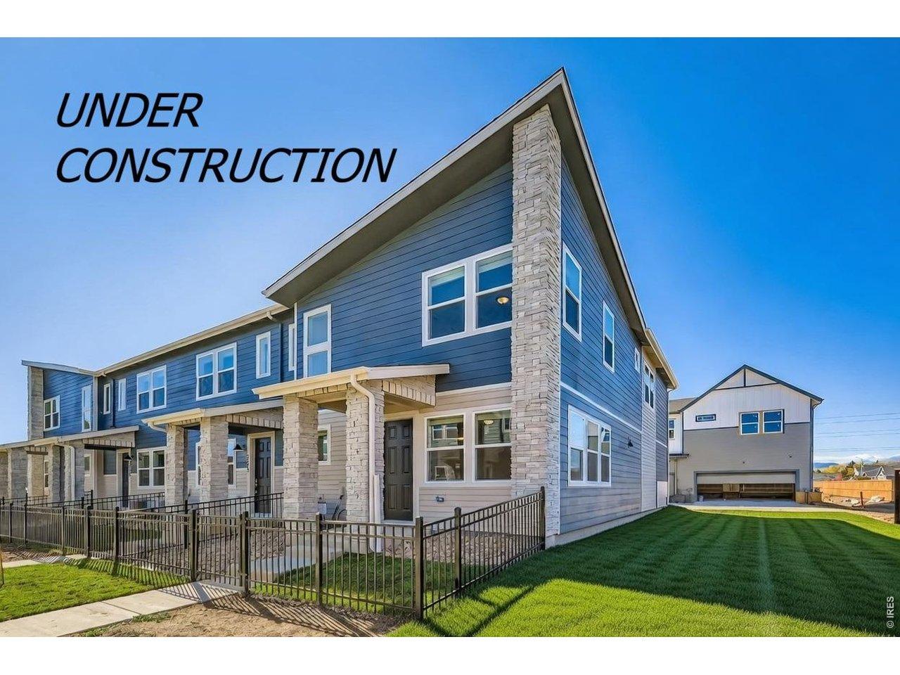 Image 1: Photo not of actual home - Beautiful End unit with tons of natural light!