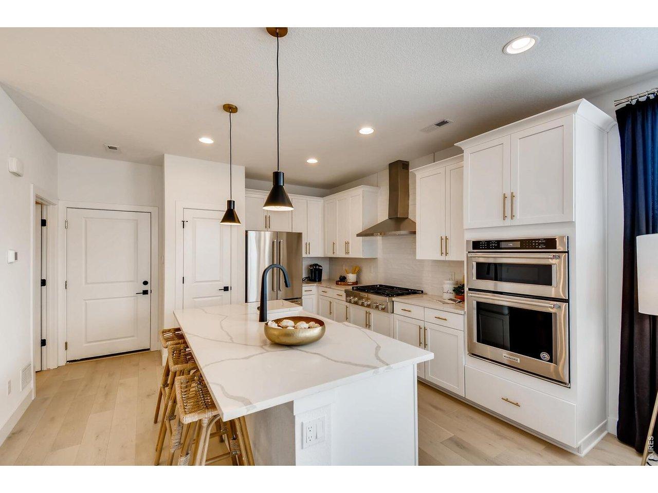 Image 2: Photo not of actual home - enjoy cooking in this Luxury Kitchen Layout!