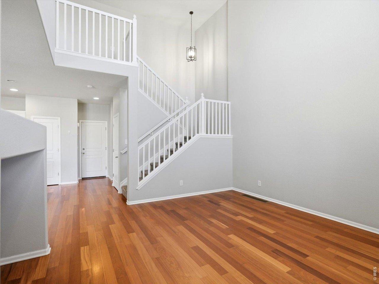 Image 3: Freshly painted interior railings and new light fixtures. Image 3: Freshly painted interior railings and new light fixtures.
