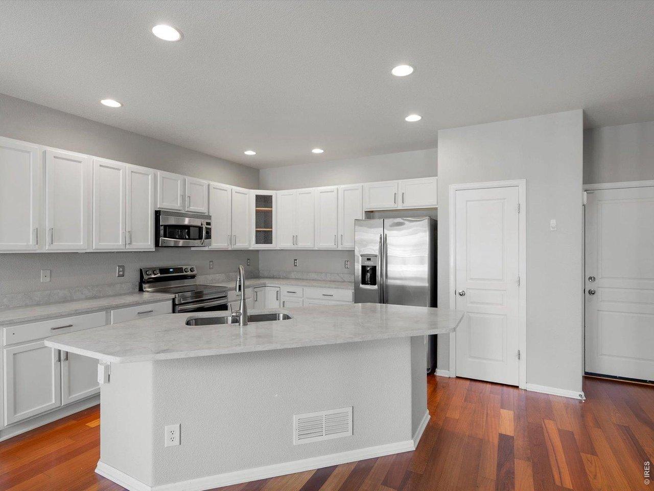 Image 4: Recently renovated kitchen with new counters, appliances, and cabinet updates. Image 4: Recently renovated kitchen with new counters, appliances, and cabinet updates.