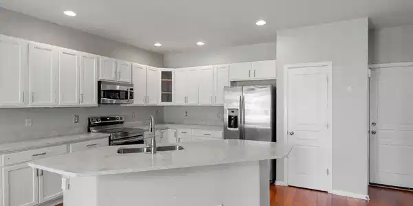 Image 4: Recently renovated kitchen with new counters, appliances, and cabinet updates. Image 4: Recently renovated kitchen with new counters, appliances, and cabinet updates.