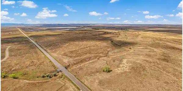 Image 3: Paved CR 82 on the South boundary