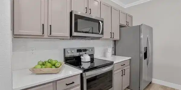 Image 3: quartz countertops, stainless appliances included