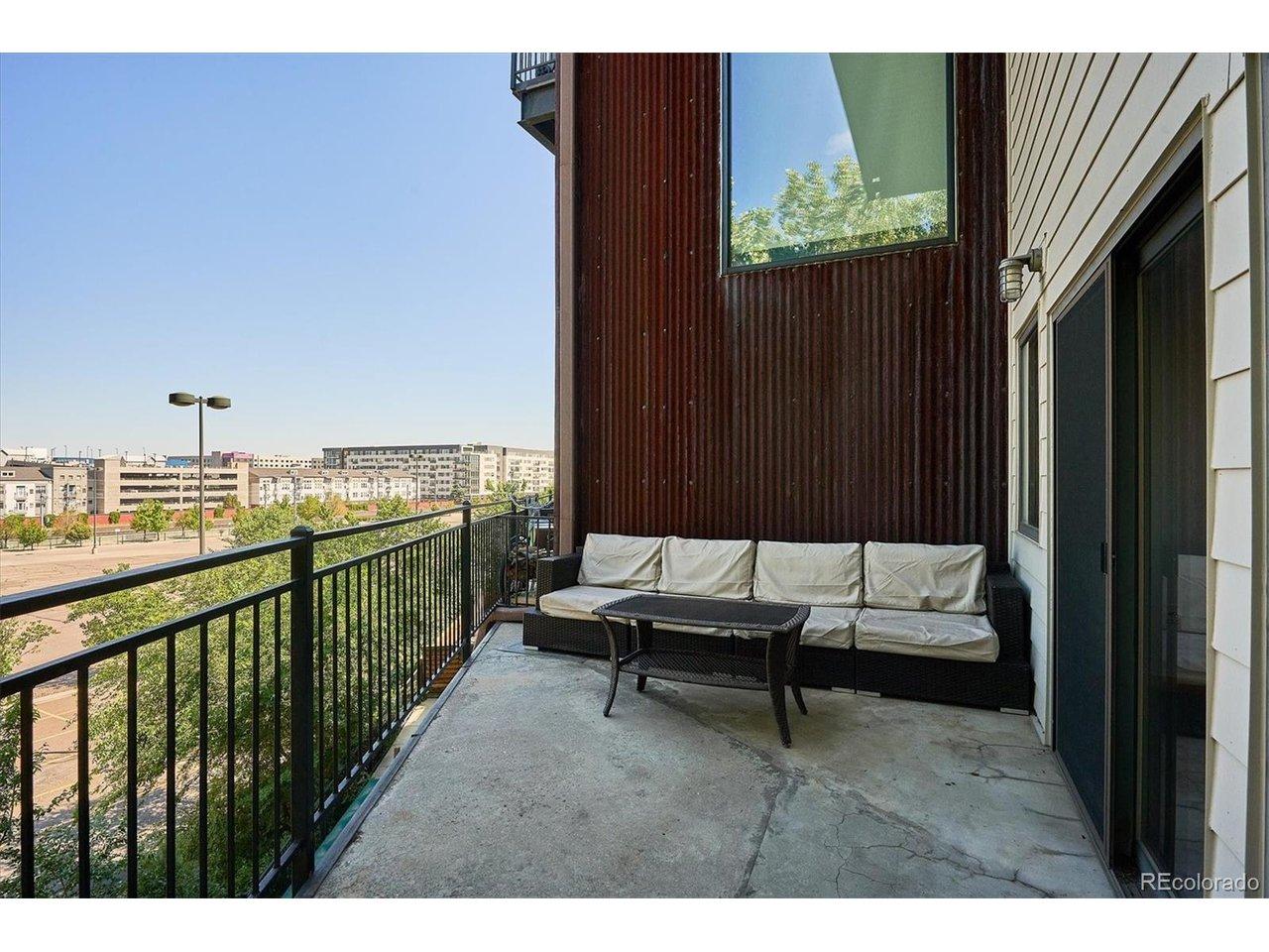 Image 4: Private patio off of the living room Image 4: Private patio off of the living room