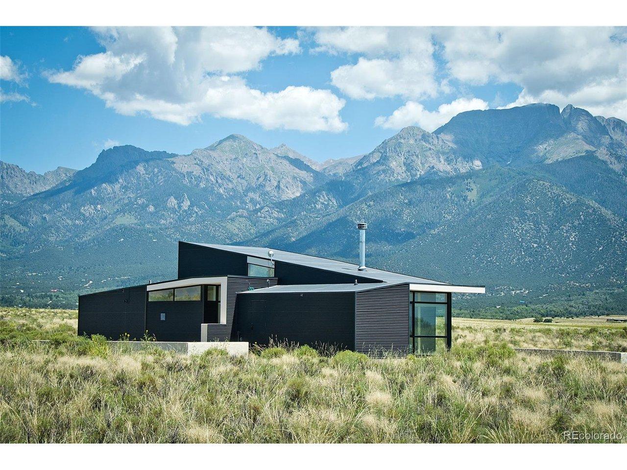 Image 1: West view of the home
