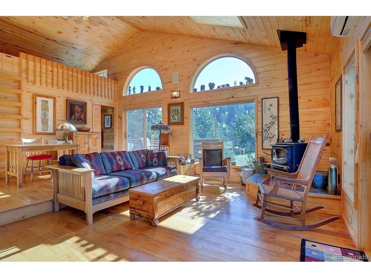 Image 4: The loft area is above this eastern living room with a bathroom close by. Image 4: The loft area is above this eastern living room with a bathroom close by.