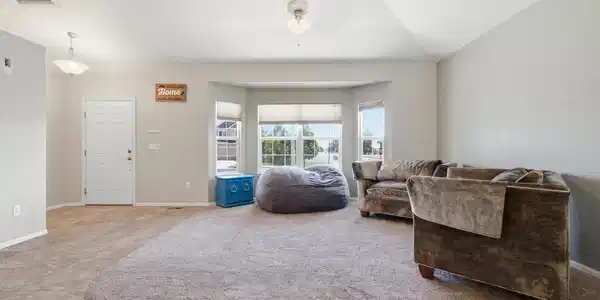 Image 3: Very large living room with a bay window