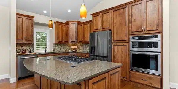 Image 4: Perfectly sized kitchen with with quartz countertops, large island, pantry and all appliances Image 4: Perfectly sized kitchen with with quartz countertops, large island, pantry and all appliances