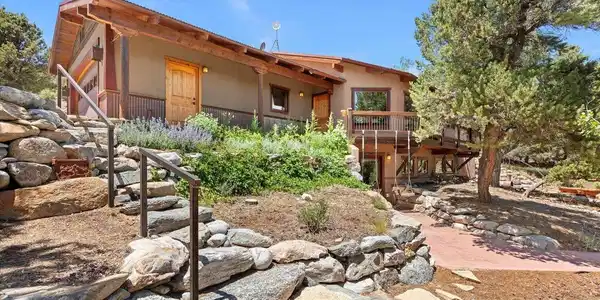 Image 2: Custom-built by Holmes Construction, set on 2.10 private acres in Saddle Ridge Ranch. Image 2: Custom-built by Holmes Construction, set on 2.10 private acres in Saddle Ridge Ranch.