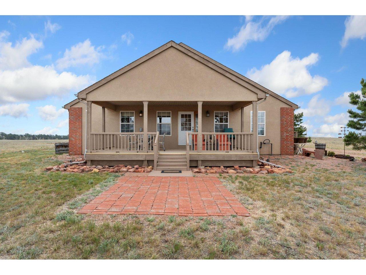 Image 2: Fully covered back deck to relax and enjoy the panoramic views!