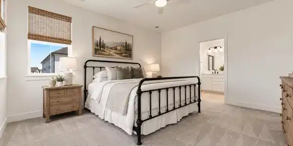 Image 3: Upstairs, the spacious primary bedroom offers a calm change of pace with soft finishes, natural light, and room to truly unwind. Image 3: Upstairs, the spacious primary bedroom offers a calm change of pace with soft finishes, natural light, and room to truly unwind.