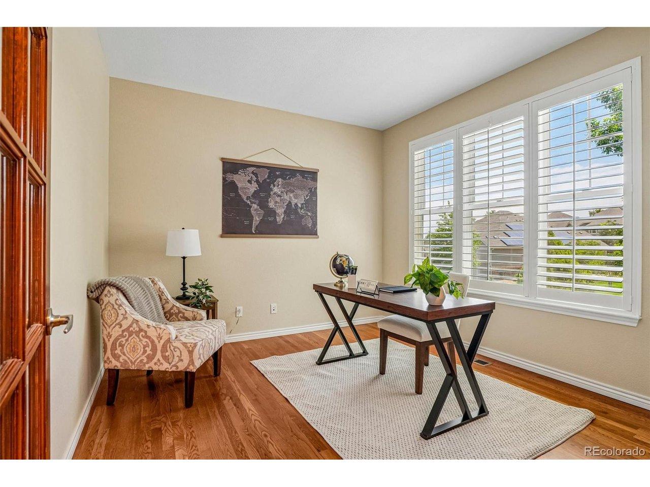 Image 4: Main Floor study with lighted French doors and Plantation shutters Image 4: Main Floor study with lighted French doors and Plantation shutters