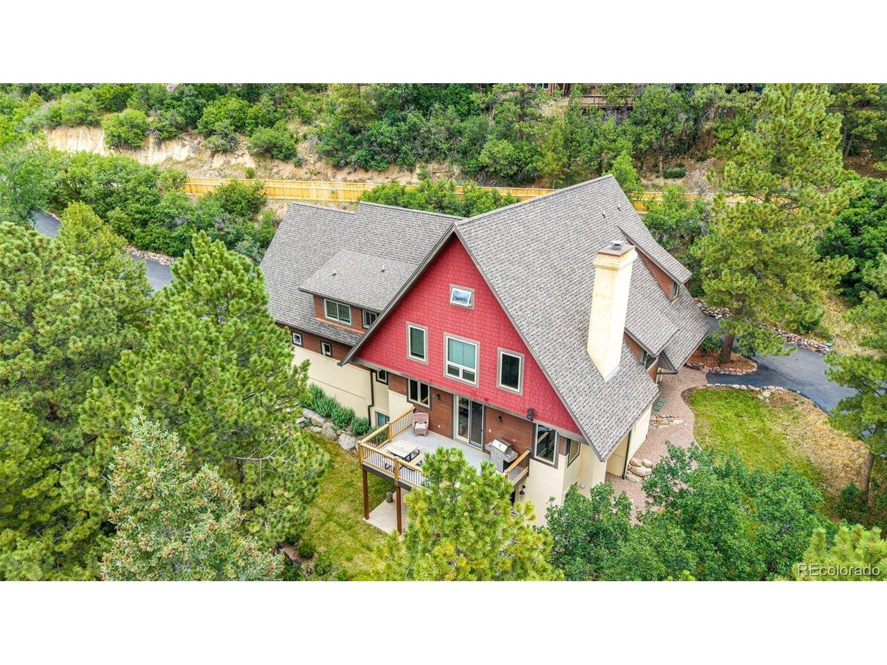 Image 4: An aerial view highlights the home's secluded setting on 2.21 wooded acres. Image 4: An aerial view highlights the home's secluded setting on 2.21 wooded acres.