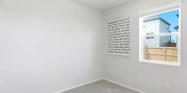 Image 4: Main floor bedroom