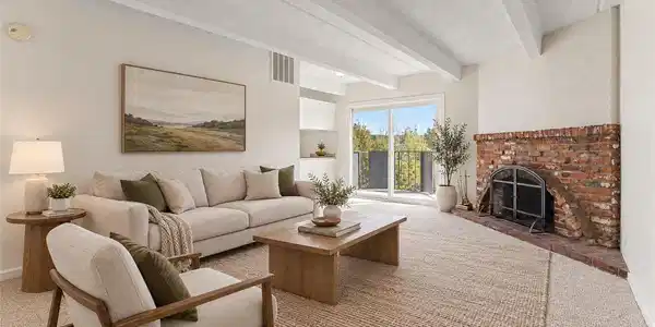 Image 4: *Virtually Staged* Spacious living room shown with furnishings to illustrate one possible furniture arrangement. Image 4: *Virtually Staged* Spacious living room shown with furnishings to illustrate one possible furniture arrangement.