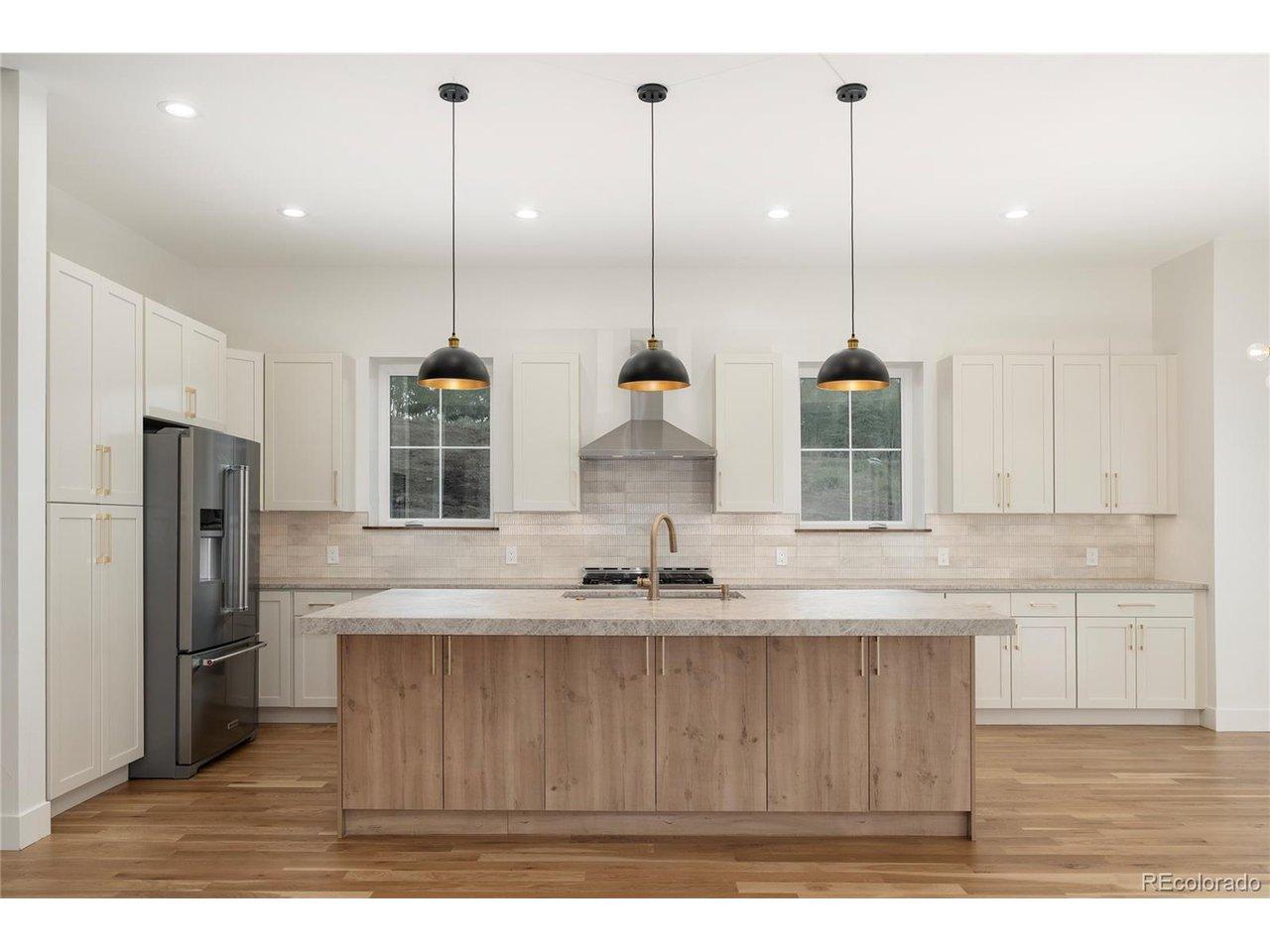 Image 2: Kitchen view from the family room. Image 2: Kitchen view from the family room.